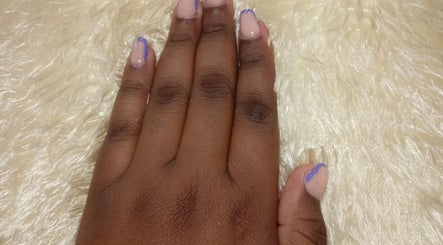 Elegant nail art design at Fielda Beauty Elegant Salon in Bridgetown, Saint Michael, BB on light fur background.