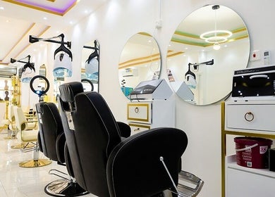 Modern salon chairs and mirrors in Beauty Parlour, Accra, Greater Accra Region, GH.