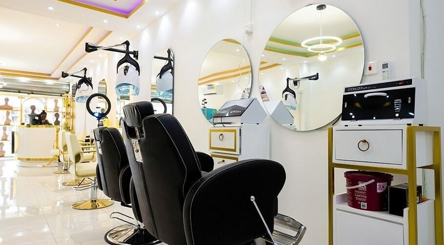 Modern salon chairs and mirrors in Beauty Parlour, Accra, Greater Accra Region, GH.