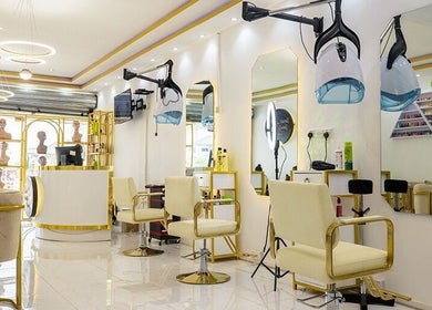 Stylish Beauty Parlour in Accra, Greater Accra Region, GH featuring modern chairs and mirrors.