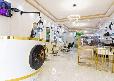 Luxurious interior of Beauty Parlour in Accra, Greater Accra Region, GH featuring elegant chairs and lighting.