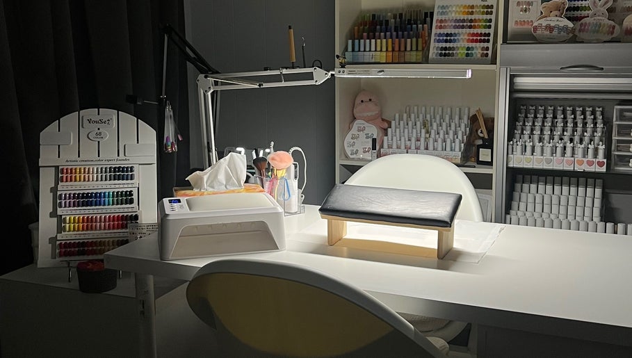 Chic manicure station at Miiso Nail Studio - Perth in Koondoola, Western Australia, AU. Nail polishes neatly displayed.