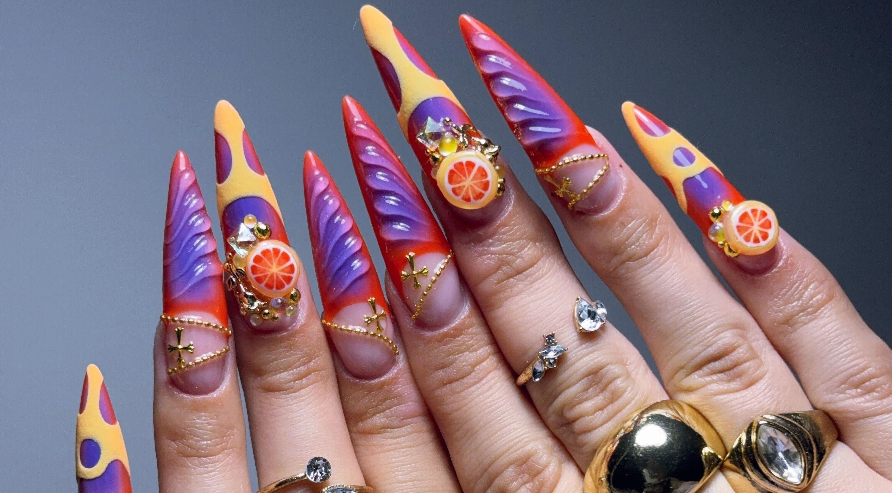 Colorful and creative nail art at Victoria Nichol Nails, Glasgow, Scotland, GB, featuring vibrant fruit designs.