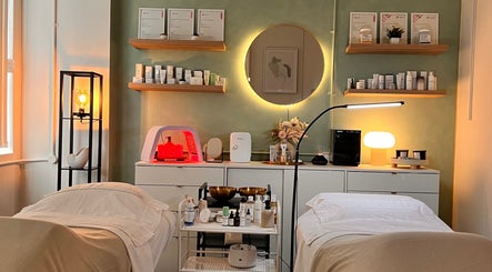 Tranquil treatment room at Misskin & Laser Studio in Birmingham, England, GB, showcasing skincare products and soft lighting.