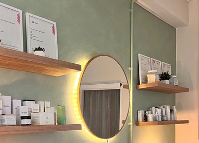 Elegant skincare display at Misskin & Laser Studio, Birmingham, England, GB, showcasing premium products and certificates.
