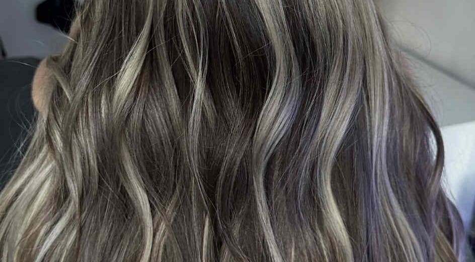 Elegant wavy hair highlights at EJ Hair & Beauty, Aberdeen, Scotland, GB.