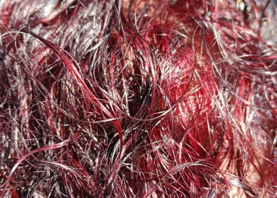 Close-up of vibrant red curls at Tylaz Hair Studio, Randburg, Gauteng, ZA.