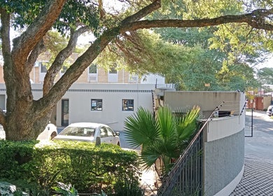 Exterior view of Tylaz Hair Studio surrounded by lush greenery in Randburg, Gauteng, ZA.