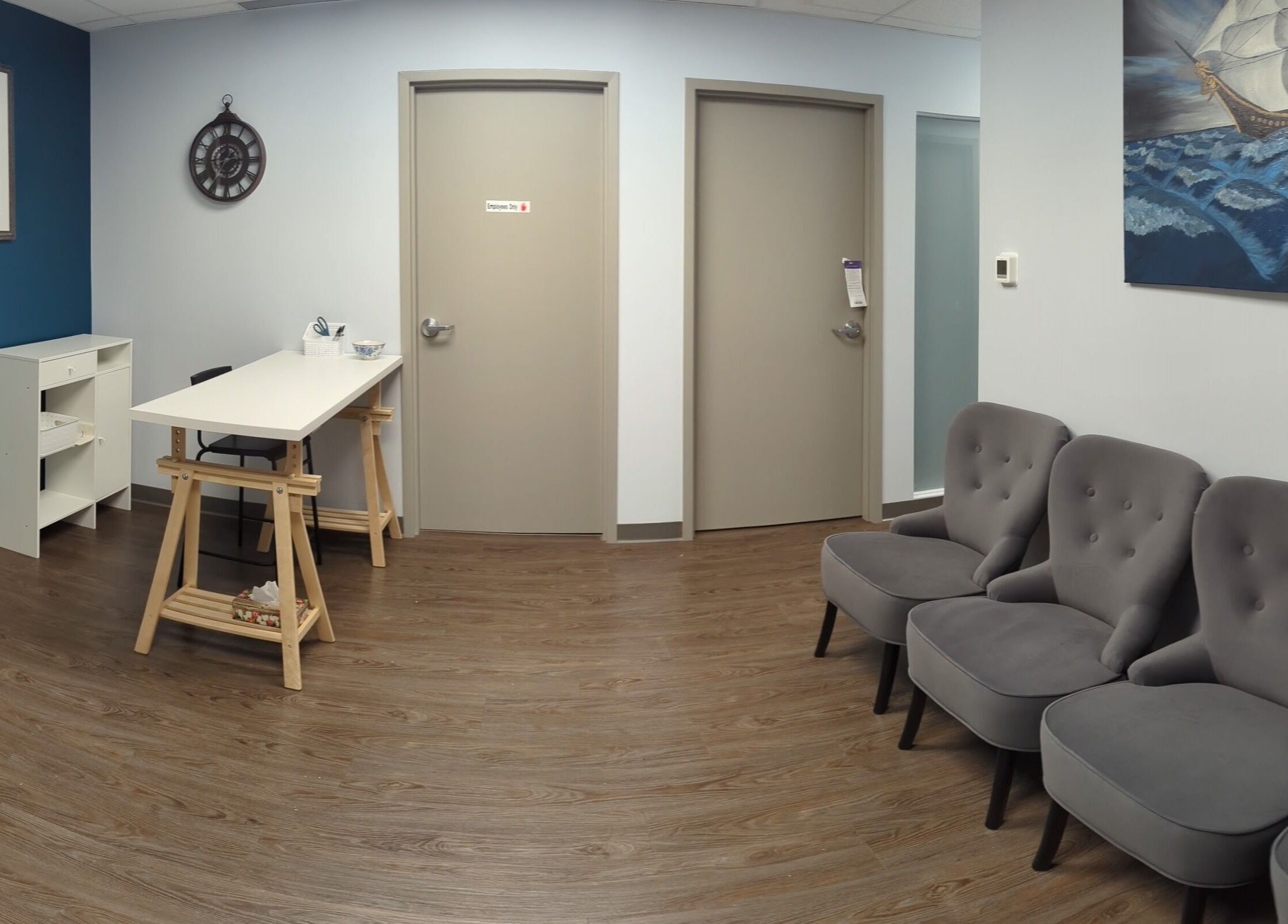 Calm waiting room at Marie Horbas RMT, West Saint Paul, Manitoba, CA, featuring comfy chairs and soothing decor.
