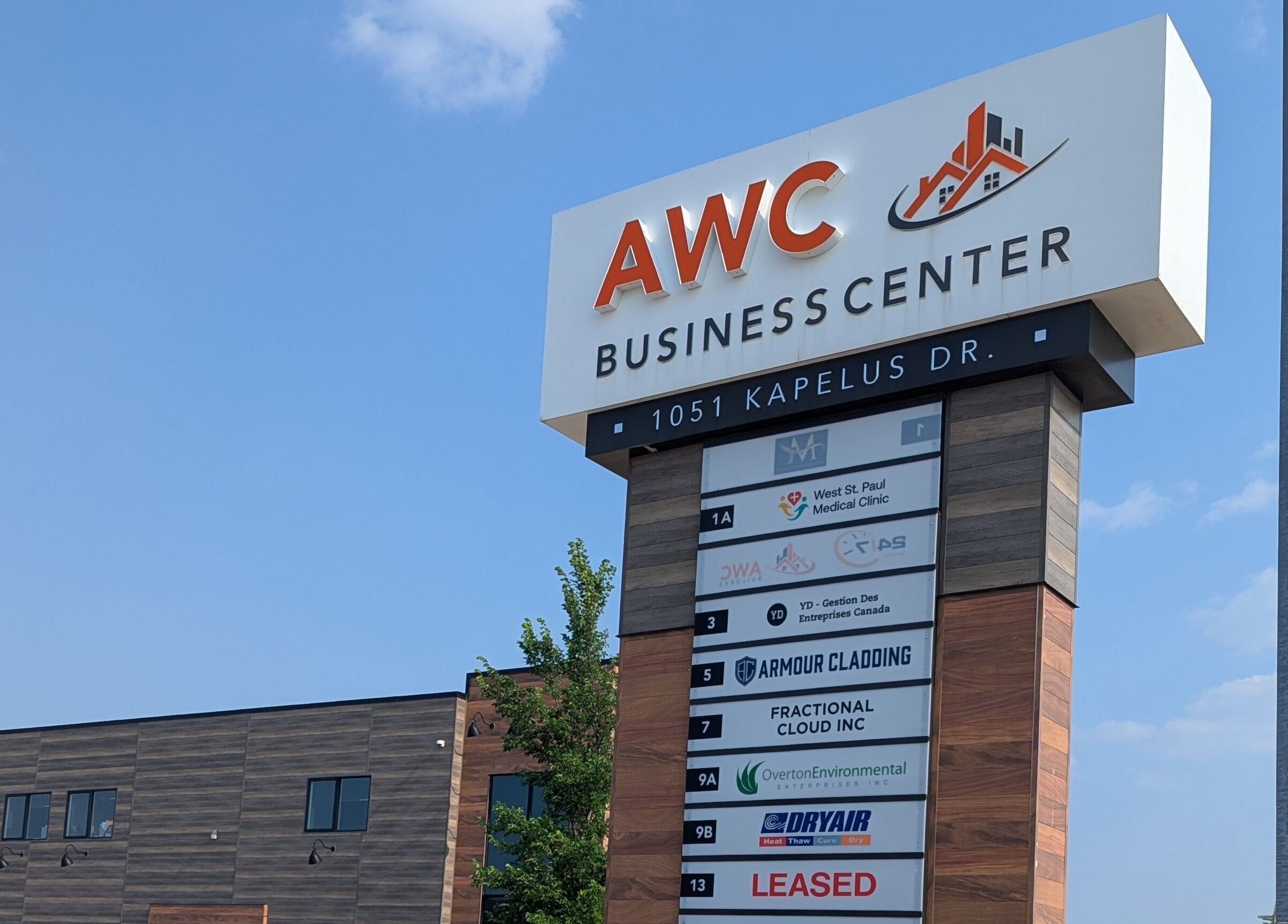 AWC Business Center sign near Marie Horbas RMT, West Saint Paul, Manitoba, CA.