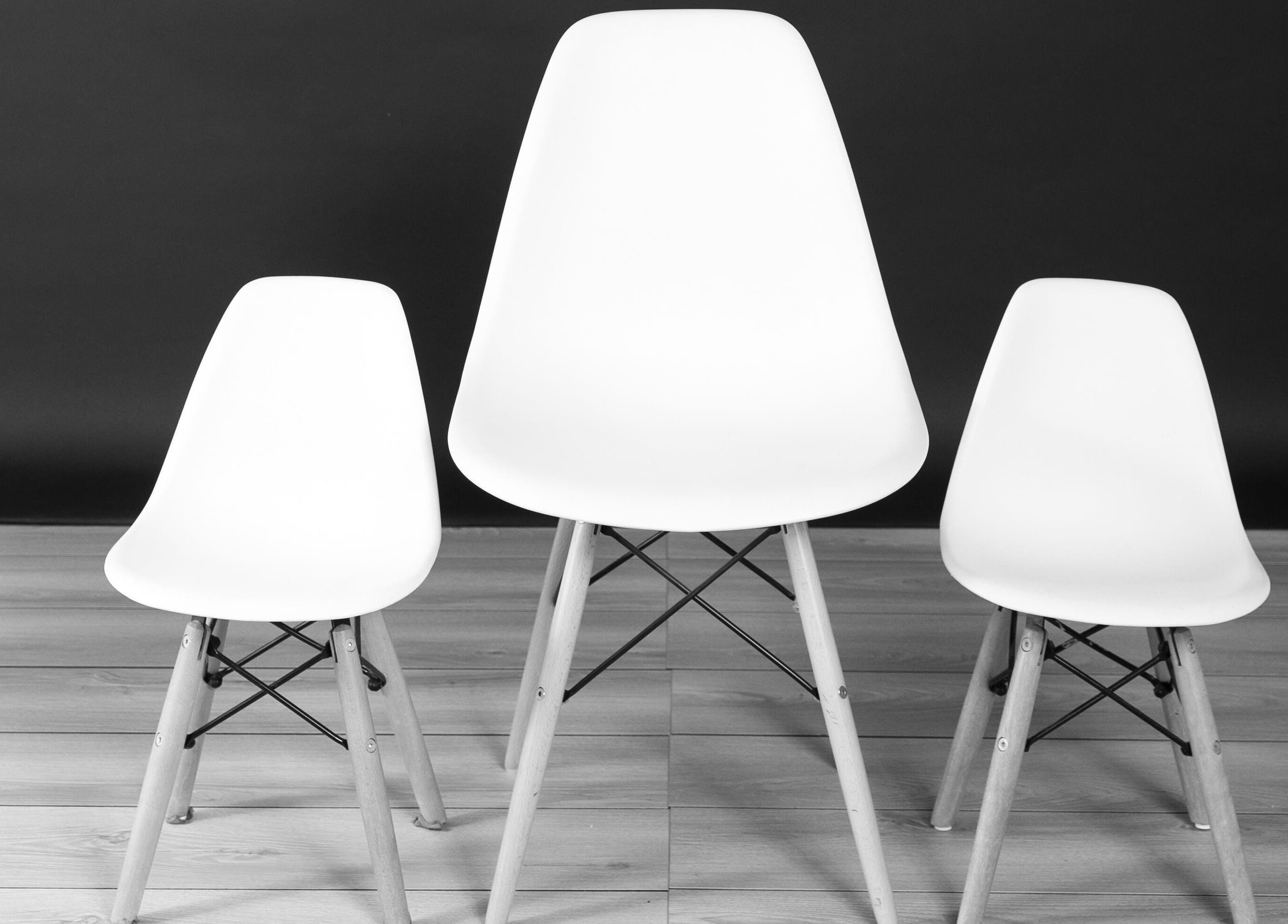 Elegant trio of modern white chairs at Studio one YEG, Edmonton, Alberta, CA.