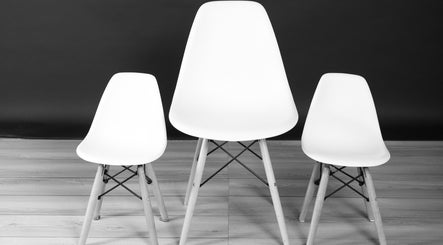 Elegant trio of modern white chairs at Studio one YEG, Edmonton, Alberta, CA.