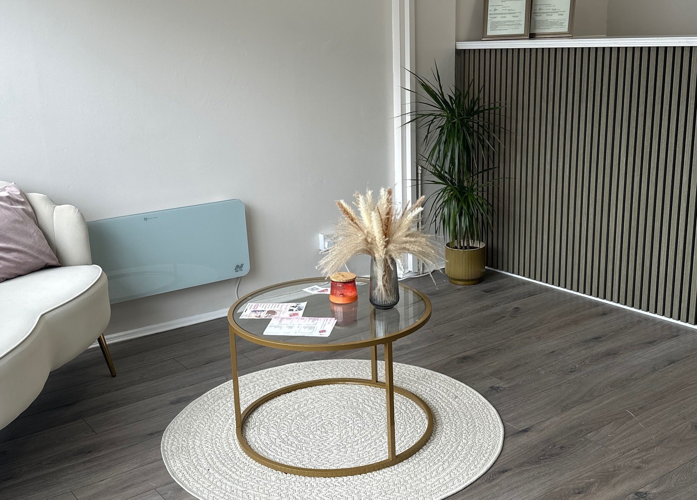 Elegant lobby of Home of Aesthetics and Beauty in Blackwood, Wales, GB, featuring modern decor and chic furnishings.