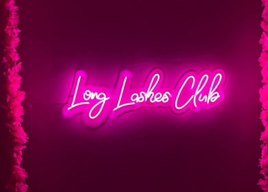 Neon 'Long Lashes Club' sign at Lash Secret (Silom Plaza), Krung Thep Maha Nakhon, TH in vibrant pink.