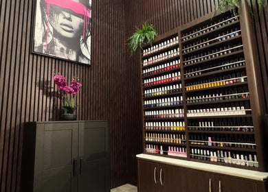 Vibrant nail polish display at Beauty Spot by Elena in North Bethesda, Maryland, US, with elegant decor.