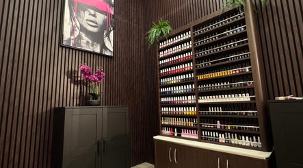 Vibrant nail polish display at Beauty Spot by Elena in North Bethesda, Maryland, US, with elegant decor.