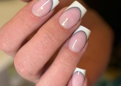 Stylish French manicure with glitter at Beauty Spot by Elena, North Bethesda, Maryland, US.