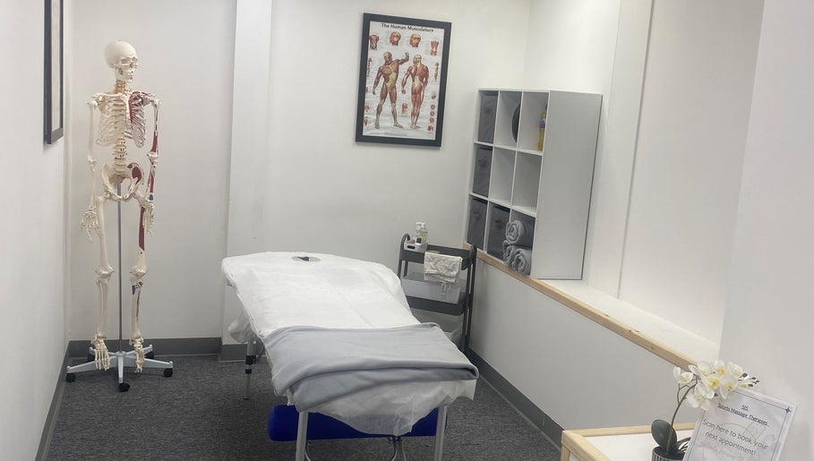 Relaxing treatment room at SJS Therapies, 1 Vigor Gym, Halifax, England, GB, featuring a massage table and decor.