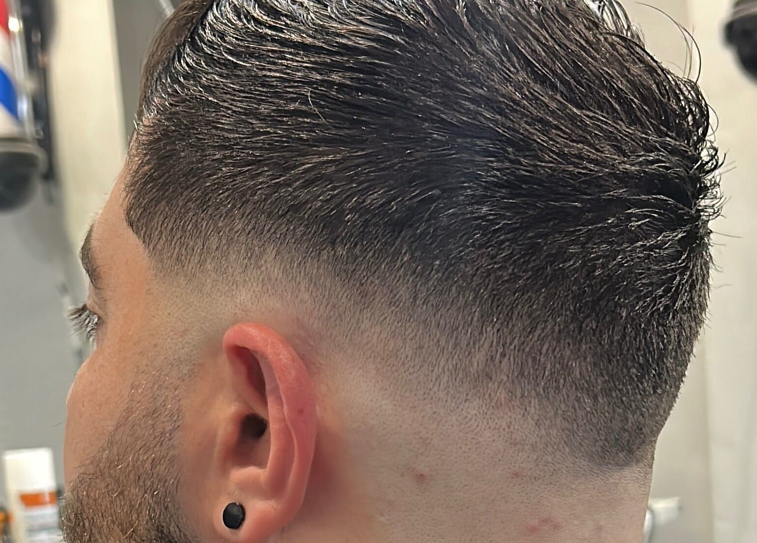 Close-up of a sharp fade haircut at Fade Arcade, Sydenham, New South Wales, AU showcasing expert styling.