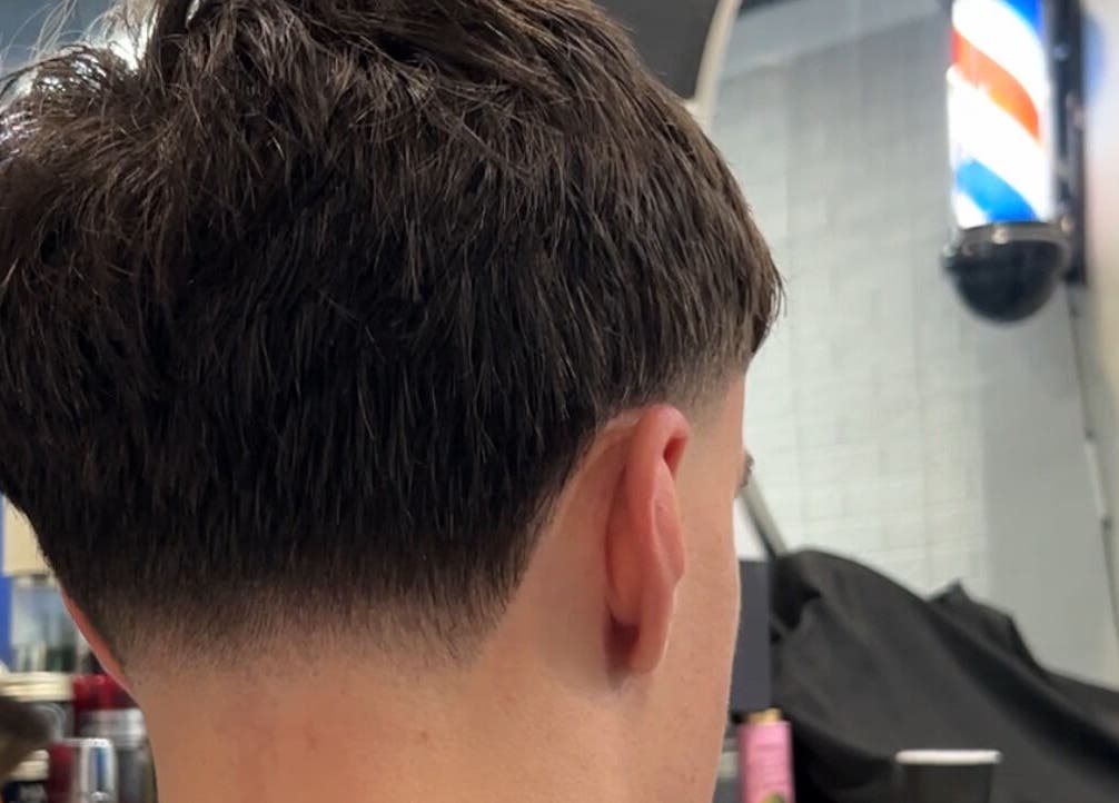 Stylish fade haircut at Fade Arcade, Sydenham, New South Wales, AU. Modern barbering excellence.