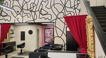 Interior of M. Curl at Tangles Salon with bold decor in Springfield, Missouri, US.