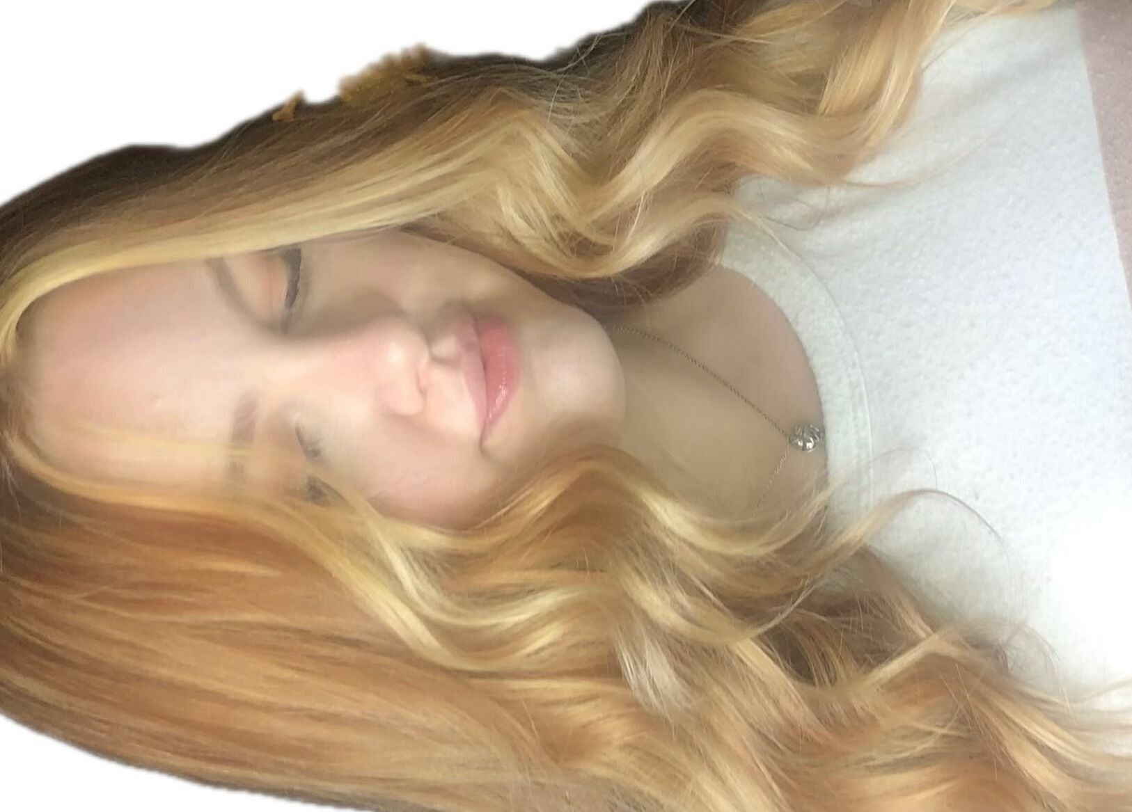 Luscious wavy hair styled at M. Curl at Tangles Salon, Springfield, Missouri, US.