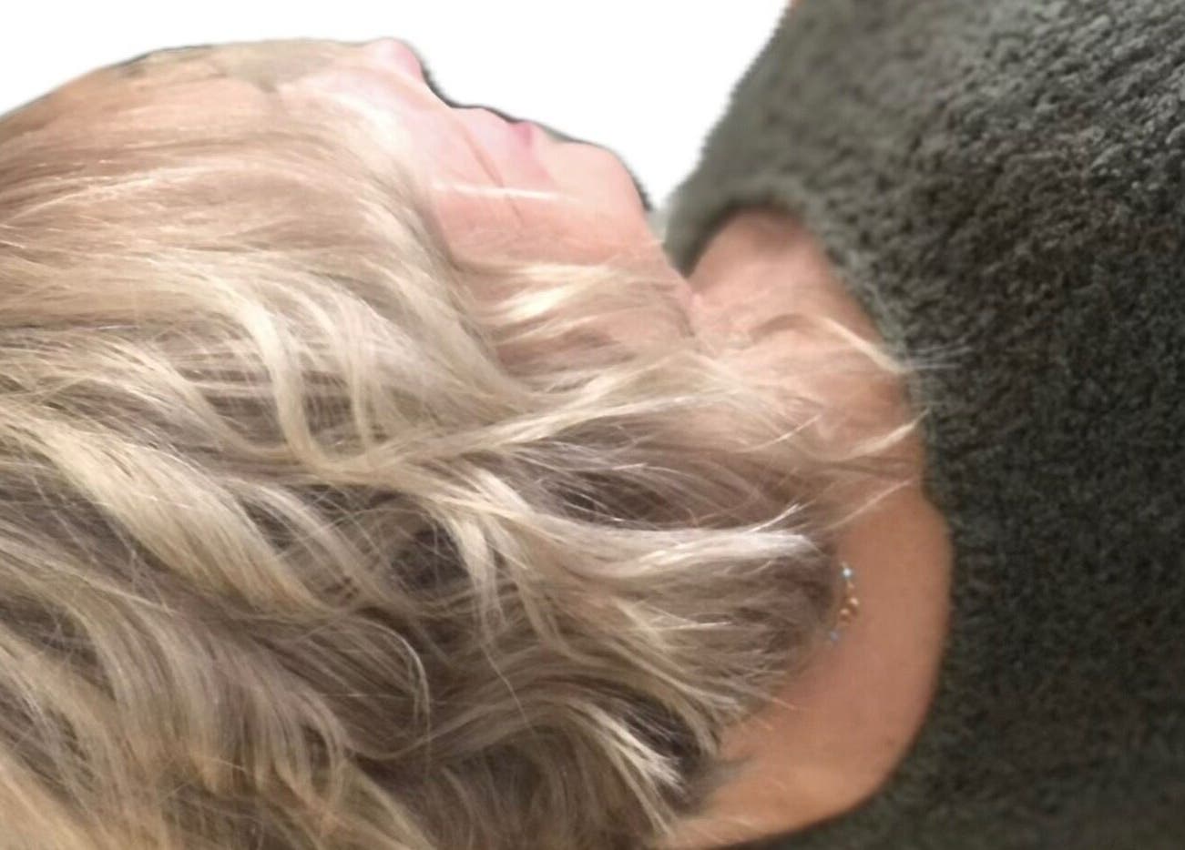 Blonde wavy bob hairstyle at M. Curl, Tangles Salon, Springfield, Missouri, US.