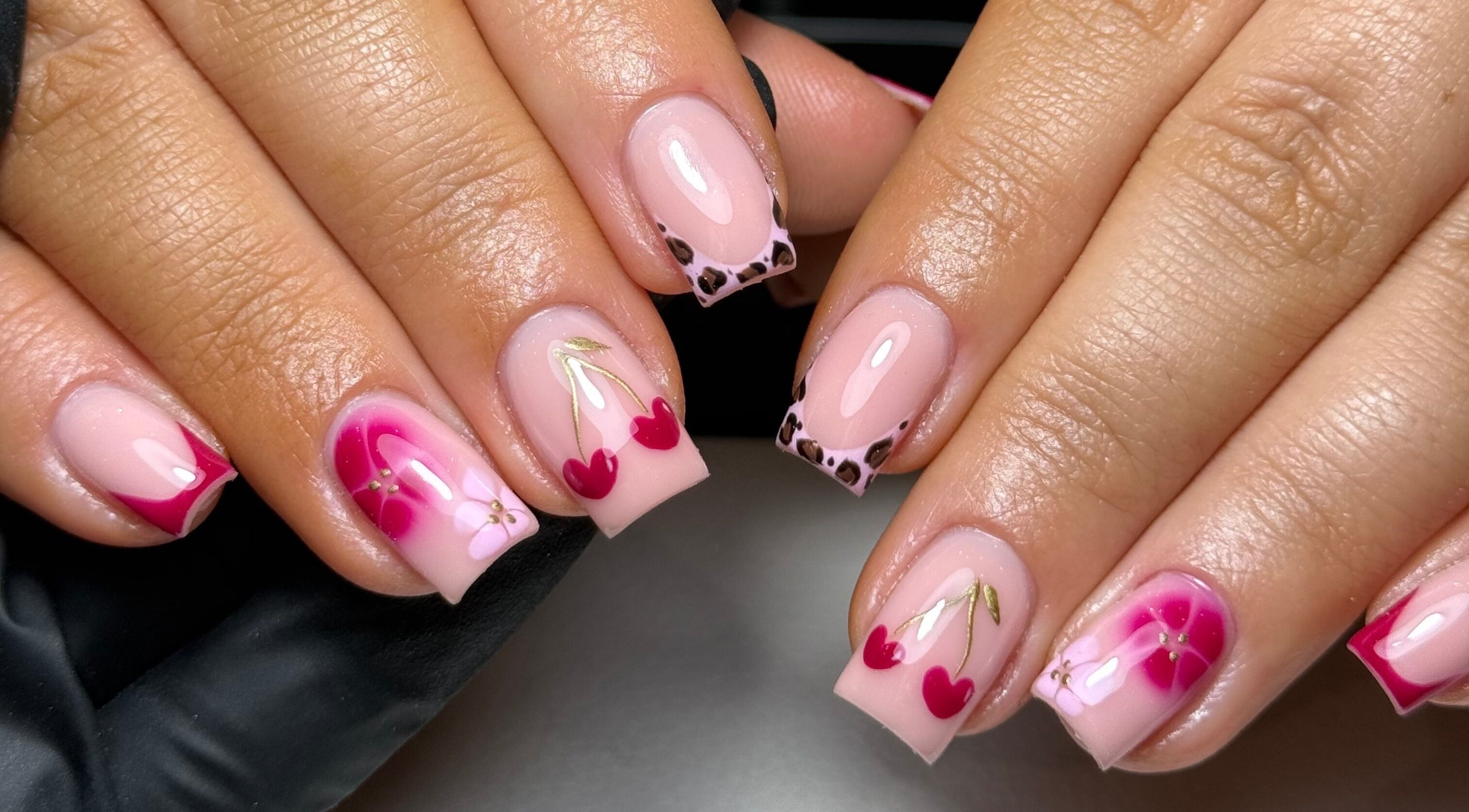 Elegant cherry-themed nail art at Nails by Jordan, Wallasey, England, GB showcasing unique designs.