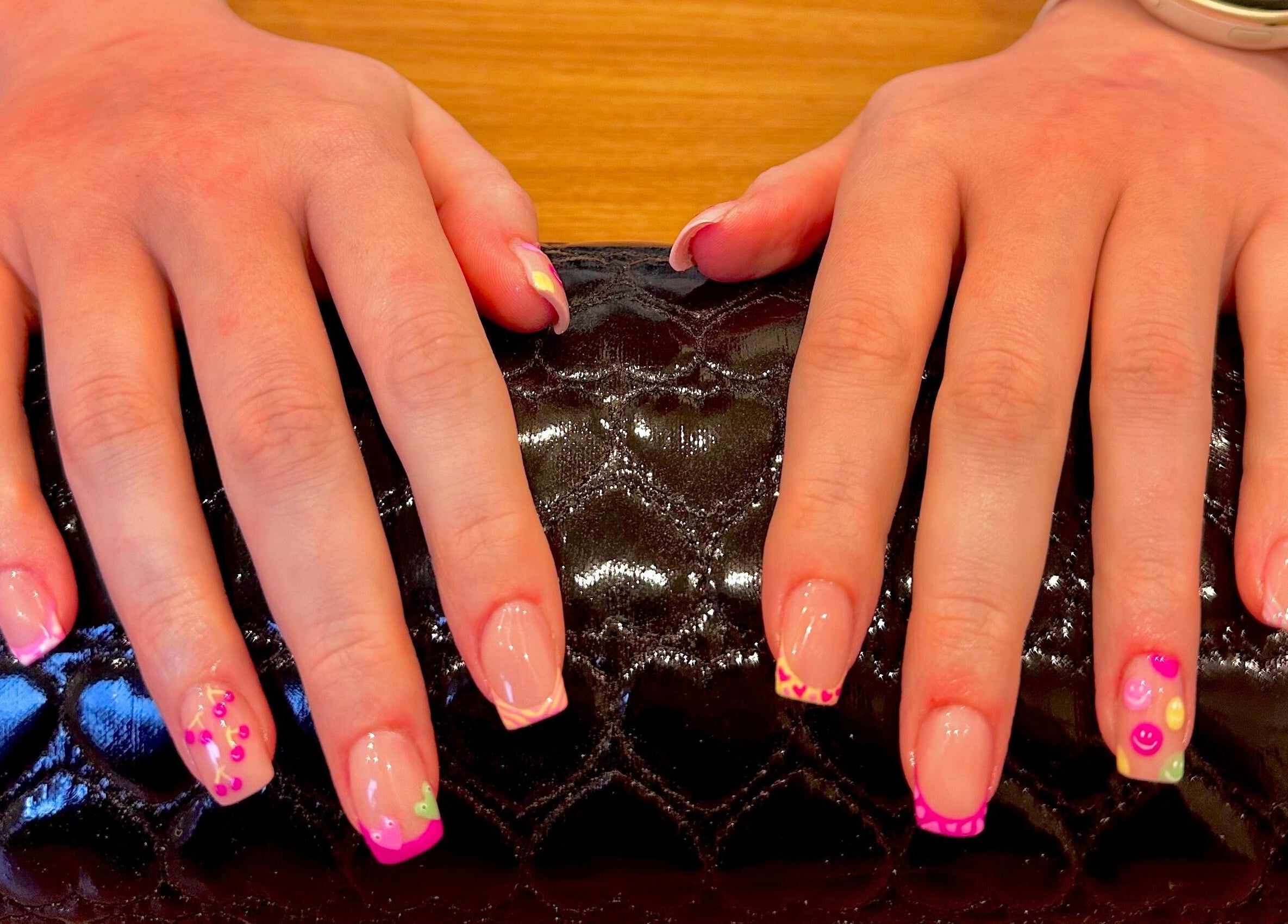 Vibrant nail art manicure at Studio Rae, Aberdeen, Scotland, GB showing creative designs and bright colors.