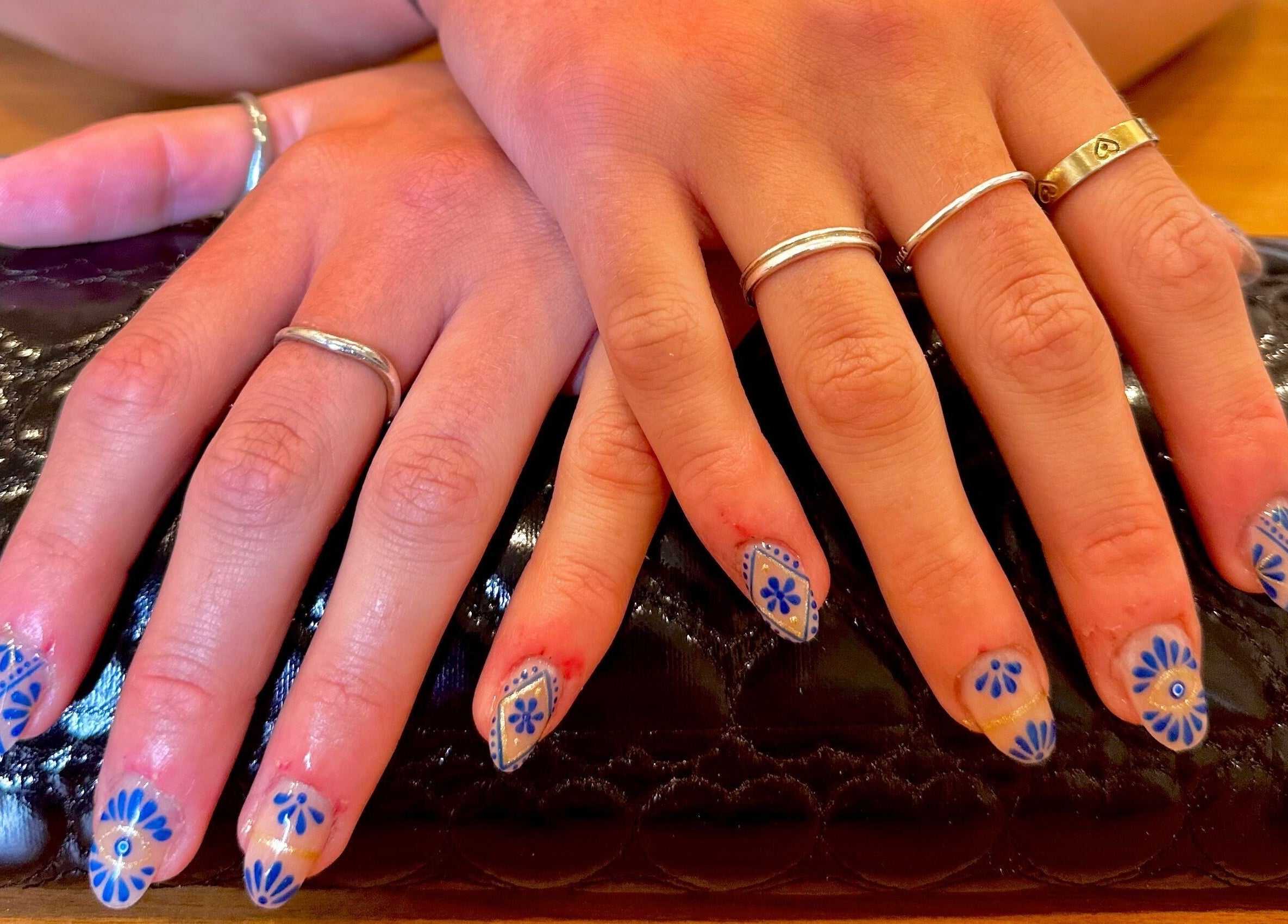 Elegant blue floral nail design at Studio Rae, Aberdeen, Scotland, GB.