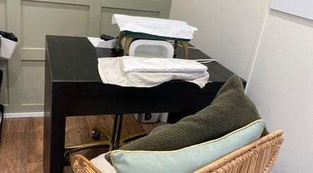 Manicure station at Flamingo Nails, Park Gate, England, GB with comfortable seating.