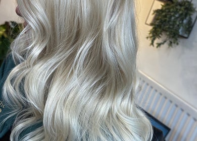 Beautiful blonde waves at The Vine Hair by Georgia, Solihull, England, GB, showcasing expert styling.