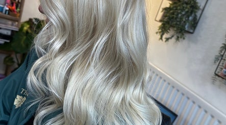 Beautiful blonde waves at The Vine Hair by Georgia, Solihull, England, GB, showcasing expert styling.