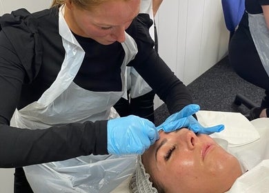 Beauty specialist performing a facial treatment at Something About You, Bearpark, England, GB.