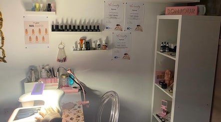 Nail care setup at Something About You in Bearpark, England, GB; shelves with polish and tools showcased.