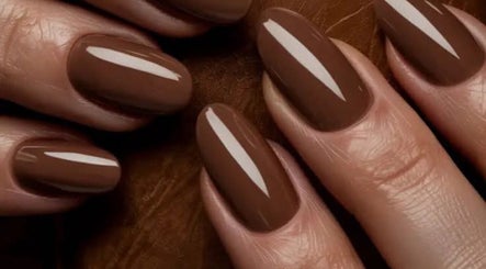 Glossy brown manicured nails at Riri Beauty Clinic, Brighton And Hove, England, GB.