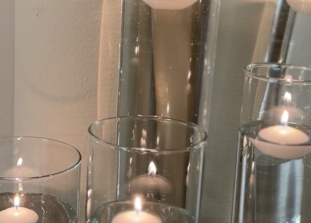 Floating candles create serene ambiance at E Elegance & Co., Paisley, Scotland, GB.