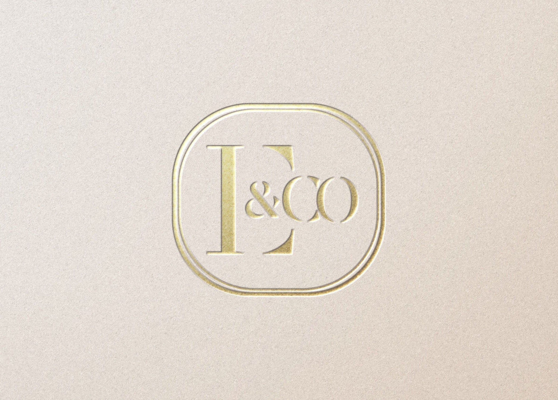 E Elegance & Co. logo on a textured background in Paisley, Scotland, GB.