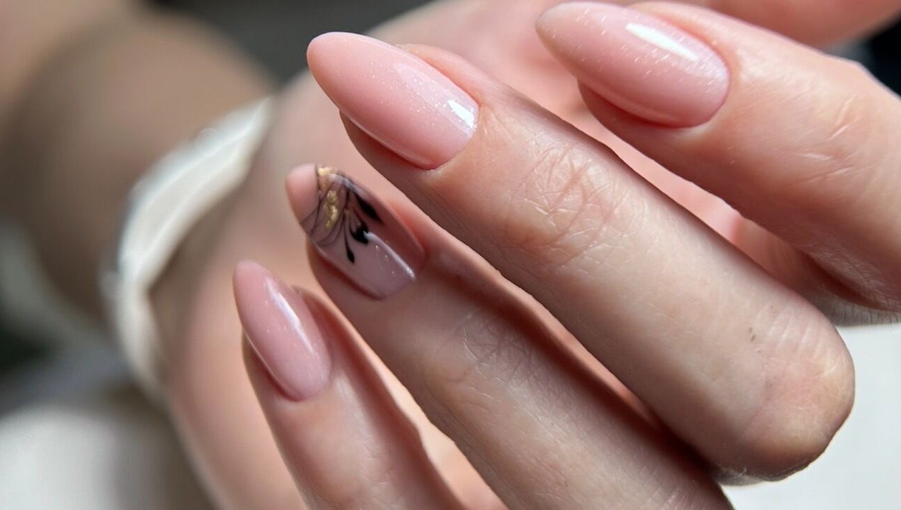 Close-up of elegant nude nails with art at Shine On Nails (Salon and Nail Academy), Pretoria, Gauteng, ZA.