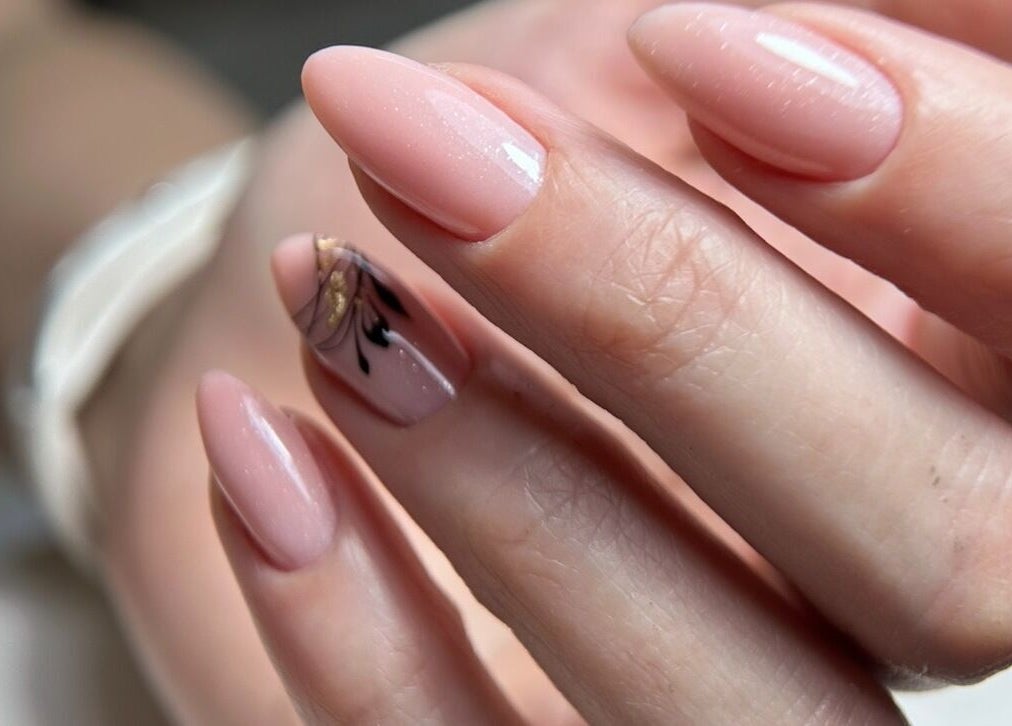 Close-up of elegant nude nails with art at Shine On Nails (Salon and Nail Academy), Pretoria, Gauteng, ZA.