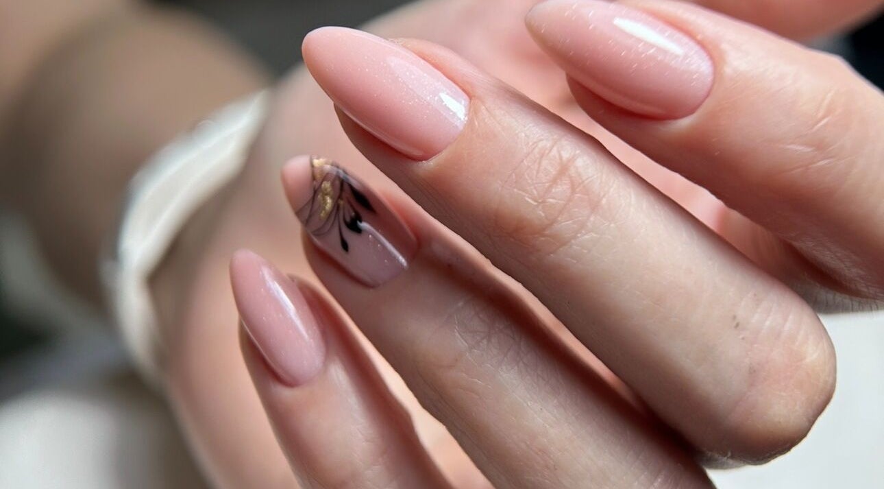 Close-up of elegant nude nails with art at Shine On Nails (Salon and Nail Academy), Pretoria, Gauteng, ZA.