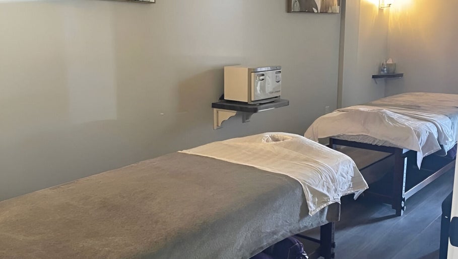 Relaxing massage tables at Gunston Massage, Lorton, Virginia, US, offering a serene spa experience.