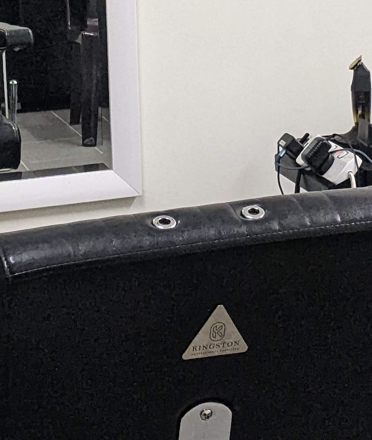 Modern salon chair and mirror setup at Propercutz, Kuala Lumpur, Wilayah Persekutuan Kuala Lumpur, MY.