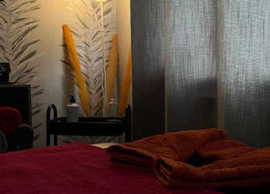 Cozy interior at The Body Club, Lisburn, Northern Ireland, GB with soft towels and ambient lighting.