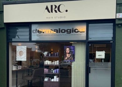 Exterior of Hairdressing by Alice in Rustington, England, GB, showcasing stylish signage and product display.