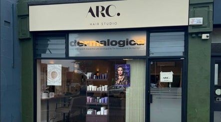 Exterior of Hairdressing by Alice in Rustington, England, GB, showcasing stylish signage and product display.