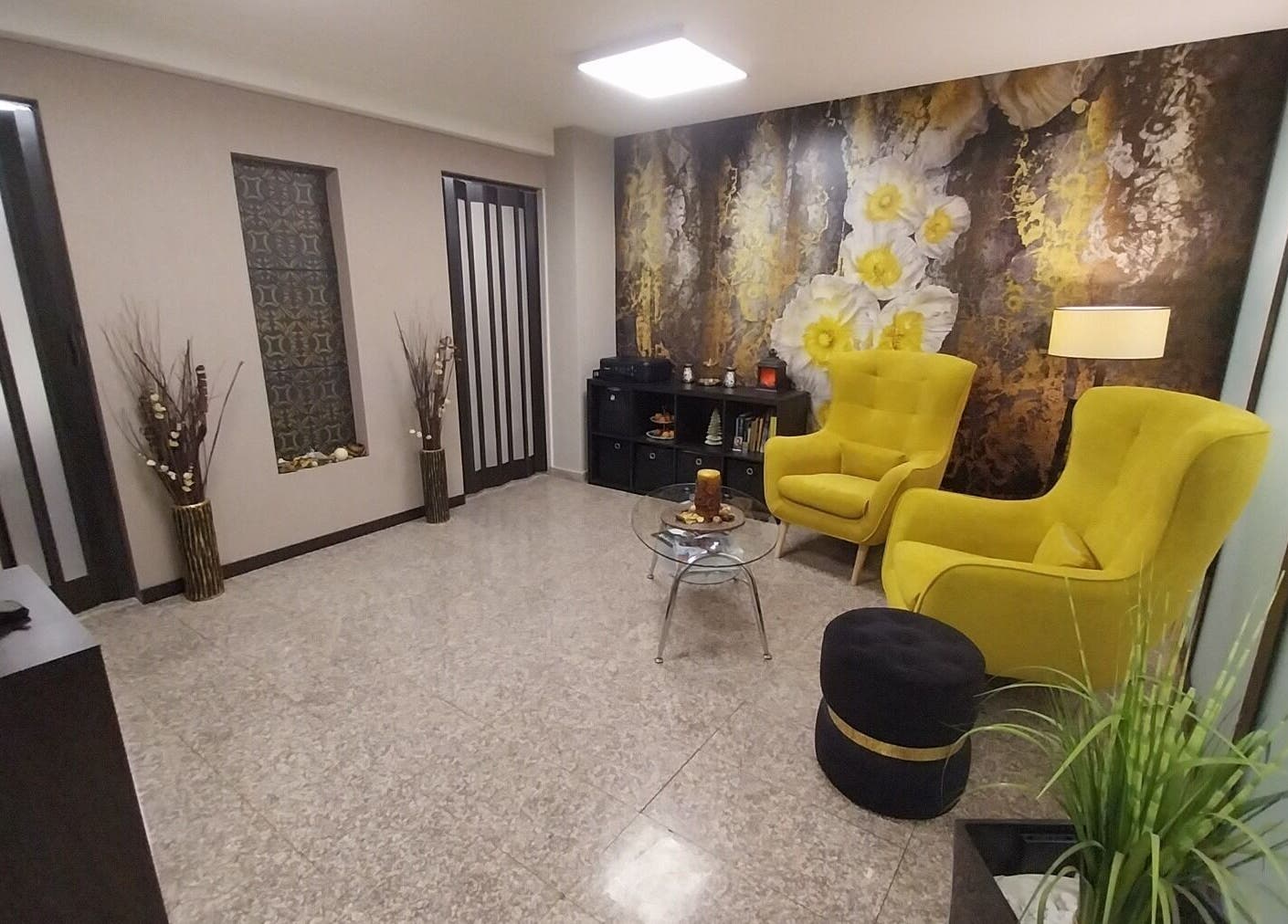Relaxing lounge area at Massage Sofia Angels | Масаж София Ейнджълс, Sofia, Област София, BG with yellow chairs.