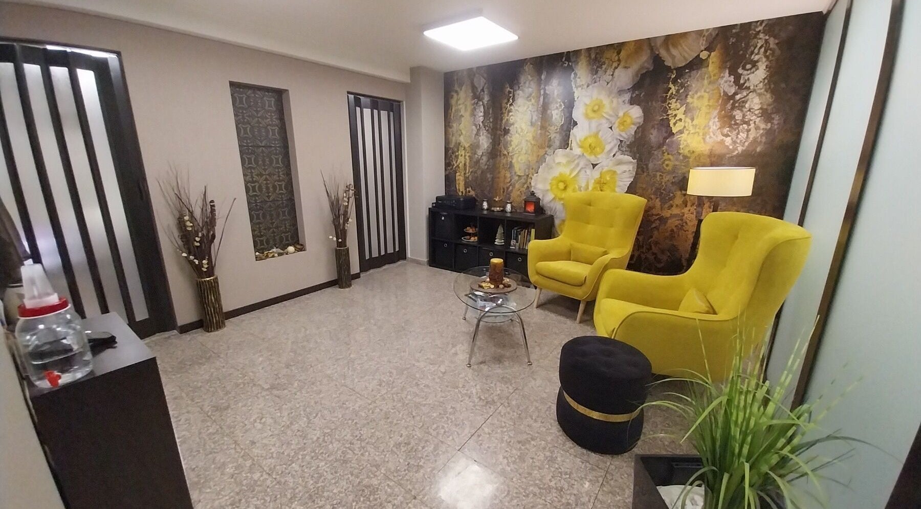 Relaxing lounge area at Massage Sofia Angels | Масаж София Ейнджълс, Sofia, Област София, BG with yellow chairs.