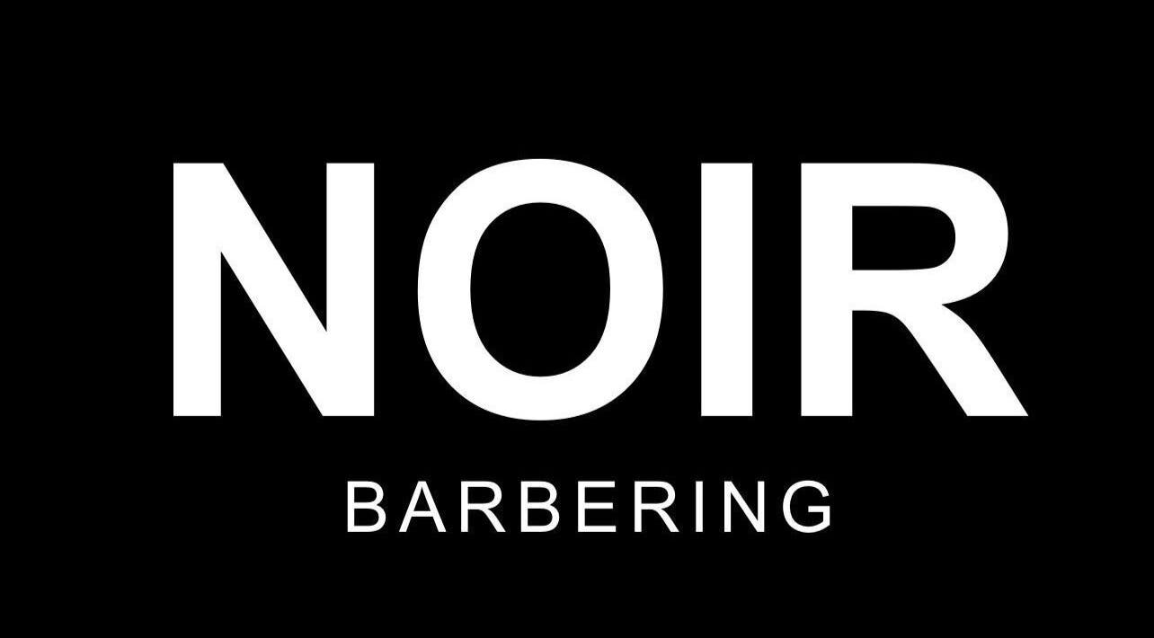 NOIR Barbering logo in bold white on black, located in Clarkston, Scotland, GB.