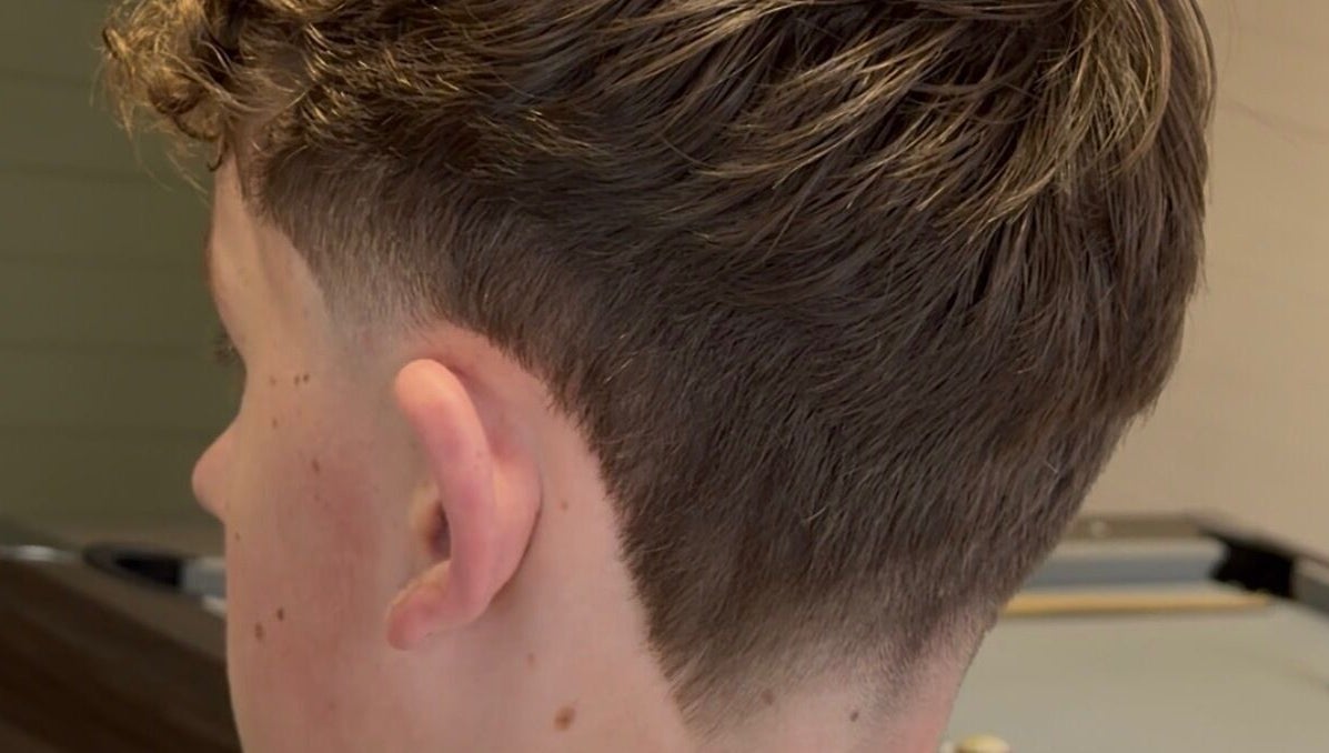 Close-up of men's undercut hairstyle at NOIR Barbering, Clarkston, Scotland, GB.